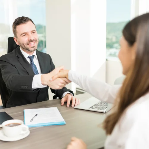 Bizconnect image of a business man and a customer shaking hands in agreement